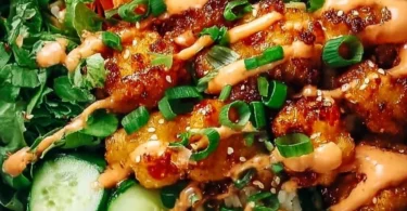 Delicious Bang Bang Chicken Bowl Delight with vibrant toppings and sauces