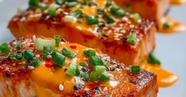 Bang Bang Salmon dish served with vibrant garnishes and a flavorful sauce