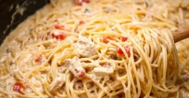 Delicious Crock Pot Cheesy Chicken Spaghetti served in a bowl