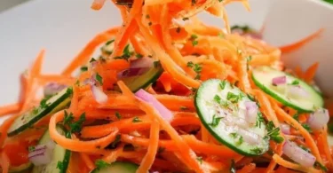 Delicious Cucumber Carrot Salad with colorful veggies and dressing