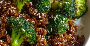 Delicious hamburger meat stir-fried with fresh broccoli in a skillet