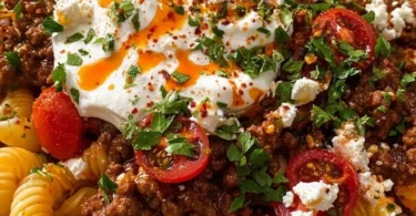 Delicious viral Turkish pasta served with fresh herbs and spices